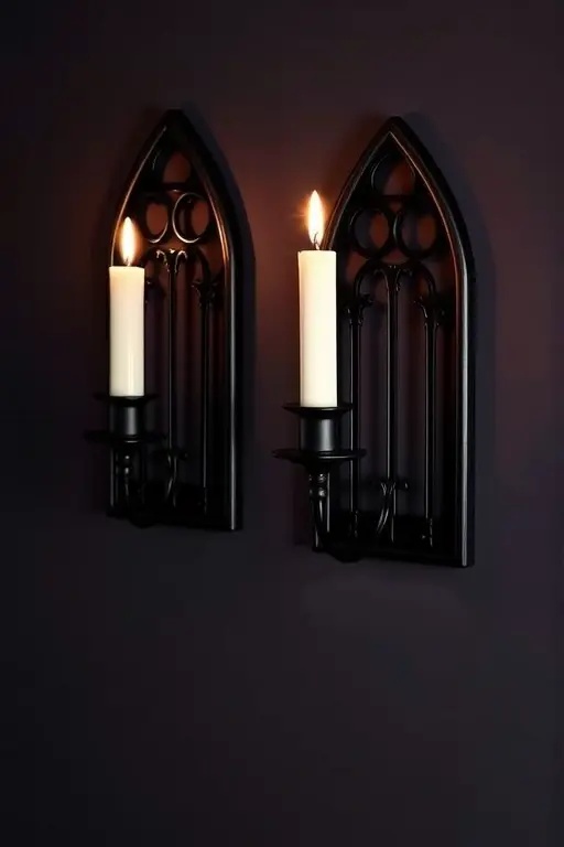 Chic Charms: Gothic Candle Holders - Embrace gothic elegance with candle-holder sconces that combine classic design with a modern twist. These sconces, featuring intricate patterns and a deep, moody palette, exude sophistication while still celebrating the spooky spirit of the season. Hang them in your hallway for a dramatic entrance that captivates the imagination.